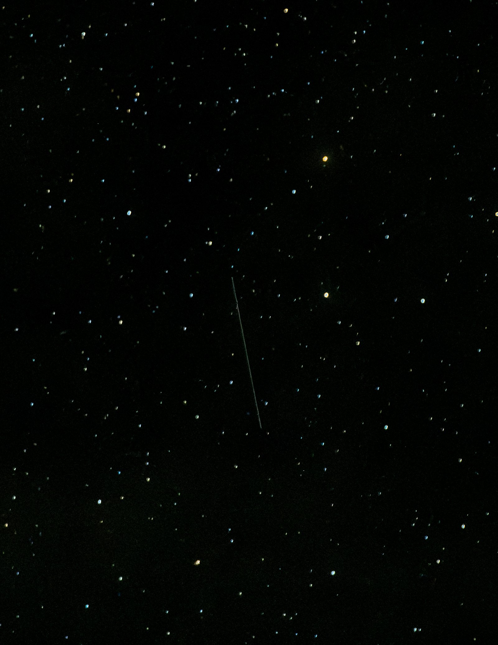 A meteor crossing a field of stars